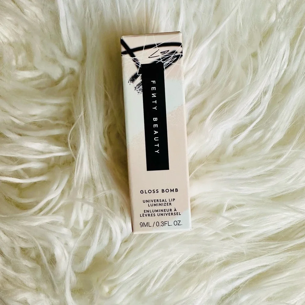 Fenty Beauty Gloss Bomb in Shimmering Gold Pearl Champ Stamp Fantasy